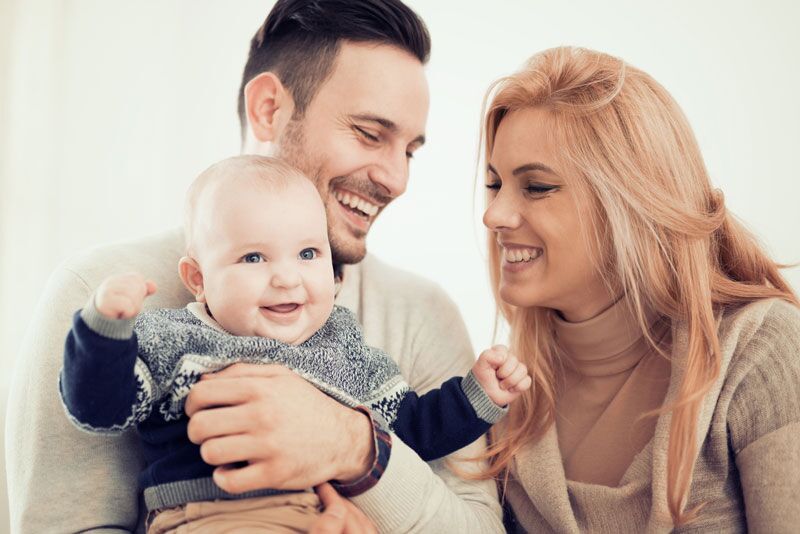 parents with their newborn