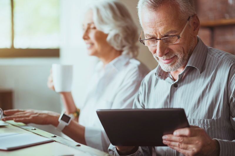 old couple looking at insurance