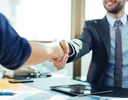 shaking hands after business promotion