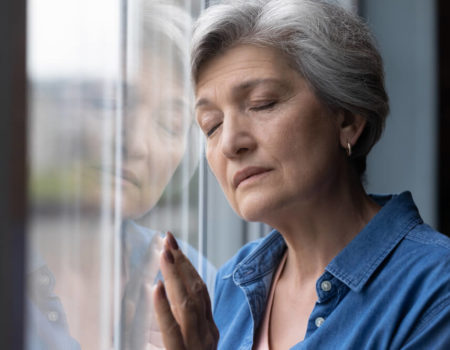 old age woman thinking about life insurance plan